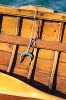 Brass oarlock on rowboat 'Archie' aboard Schooner 'Heritage'