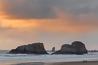 A stormy sunset on Bird Rocks, Cannon Beach, Oregon, U.S.