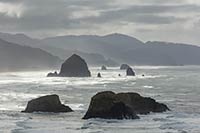 Bird Rocks, Haystack, and Silver Point on a blustery, rainy day, Cannon Beach, Oregon, U.S.
